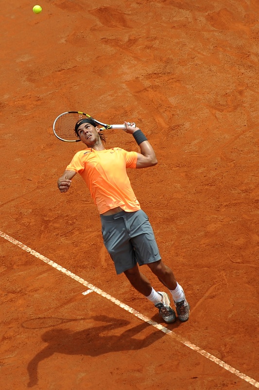 Photo:  Spanish Rafael Nadal Serves to Novak, first set Mens Final Rome 2012 